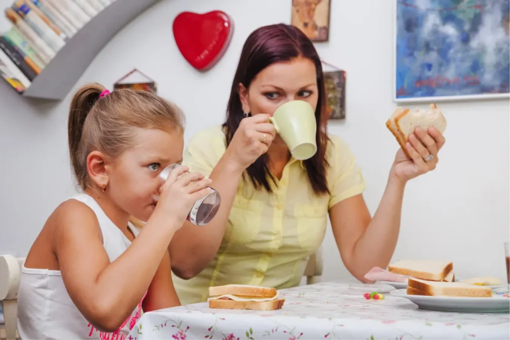 A mother and her daughter having breakfast