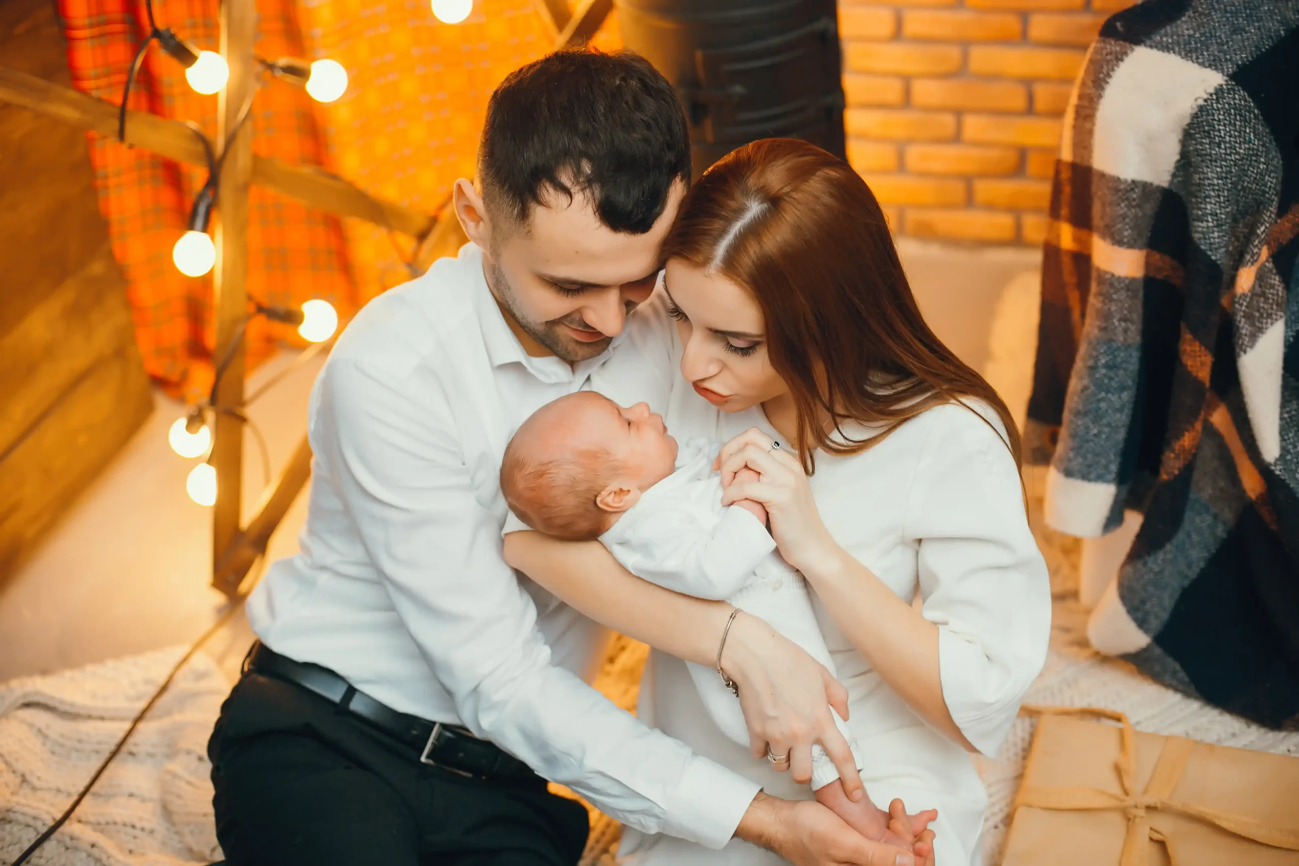 parents babeling with their baby