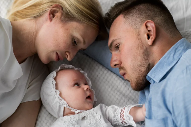 baby in conversation with parents